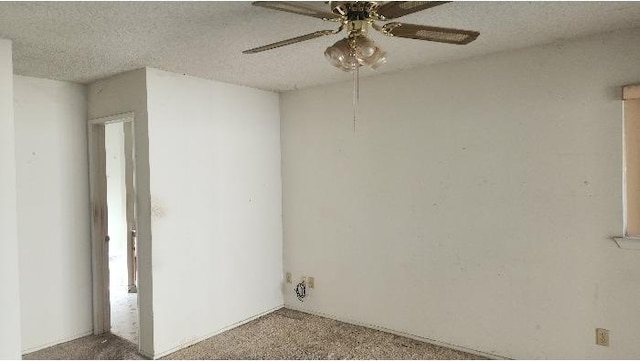 6377 N Genoa Ave, Fresno, CA 93722 - spare room with a ceiling fan and carpet floors