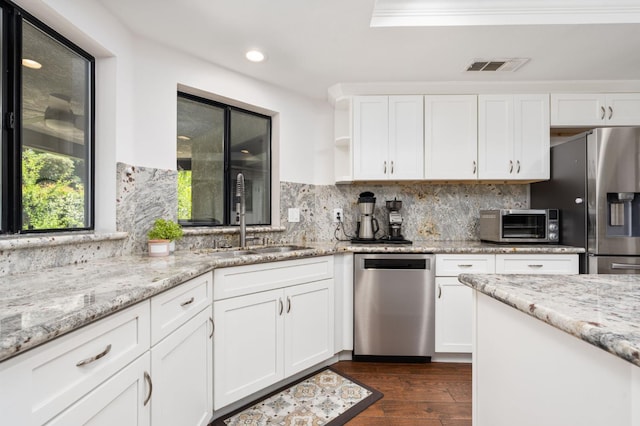 8814 N Spalding, Fresno, CA 93720 - kitchen featuring stainless steel appliances, a sink, recessed lighting, white cabinetry, and backsplash