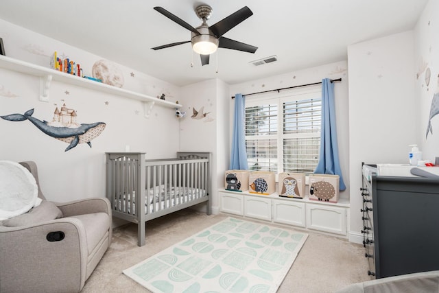 8814 N Spalding, Fresno, CA 93720 - bedroom featuring light colored carpet, a nursery area, and a ceiling fan