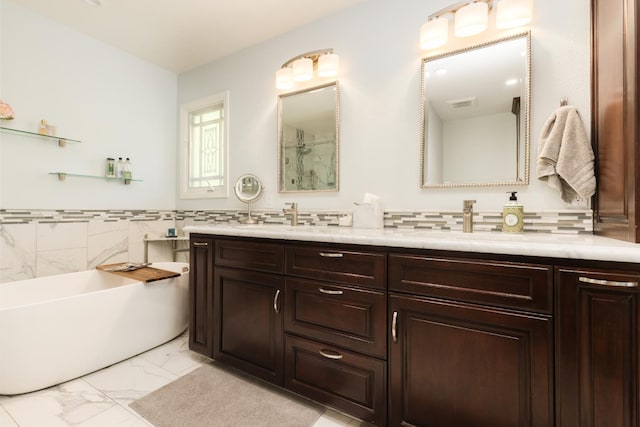 499 E Braddock Dr, Fresno, CA 93720 - full bath featuring marble finish floors, a bathtub, and double vanity