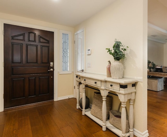 499 E Braddock Dr, Fresno, CA 93720 - entryway featuring dark wood finished floors and baseboards