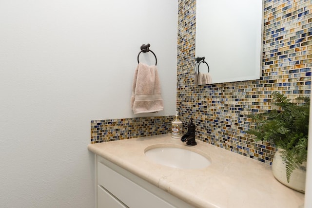 499 E Braddock Dr, Fresno, CA 93720 - bathroom featuring vanity and tasteful backsplash