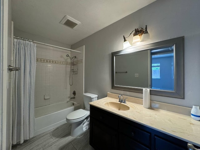 2761 N Selland, Fresno, CA 93722 - full bath featuring vanity, toilet, and shower / tub combo with curtain
