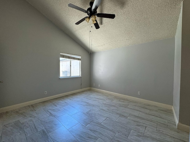 2761 N Selland, Fresno, CA 93722 - spare room with a textured ceiling, a ceiling fan, and lofted ceiling