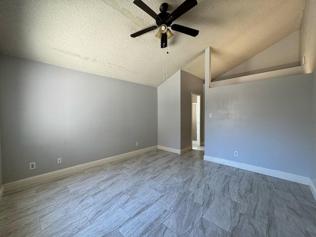 2761 N Selland, Fresno, CA 93722 - empty room featuring a textured ceiling, a ceiling fan, and vaulted ceiling