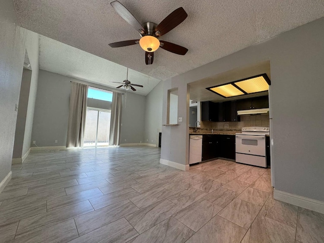2761 N Selland, Fresno, CA 93722 - kitchen with white appliances, under cabinet range hood, a textured ceiling, baseboards, and a ceiling fan