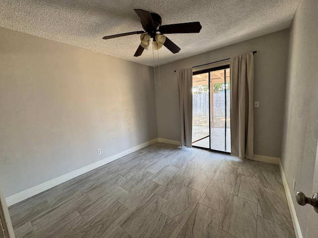 2761 N Selland, Fresno, CA 93722 - spare room with a textured ceiling, ceiling fan, and baseboards
