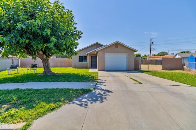 829 W Woodward Ave, Fresno, CA 93706 - single story home with stucco siding, an attached garage, and concrete driveway