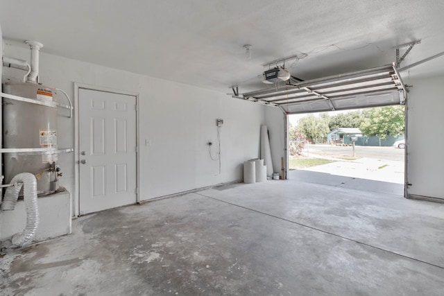 829 W Woodward Ave, Fresno, CA 93706 - garage featuring a garage door opener