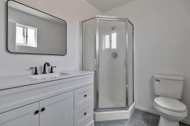 829 W Woodward Ave, Fresno, CA 93706 - bathroom featuring vanity, a stall shower, tile patterned flooring, and toilet