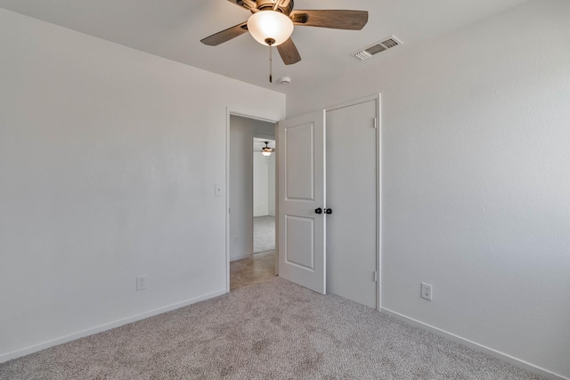 829 W Woodward Ave, Fresno, CA 93706 - unfurnished room with light carpet, ceiling fan, and baseboards