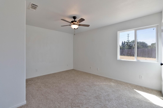 829 W Woodward Ave, Fresno, CA 93706 - unfurnished room with carpet flooring, ceiling fan, and baseboards