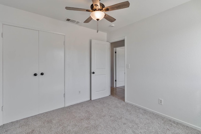 829 W Woodward Ave, Fresno, CA 93706 - unfurnished bedroom with light colored carpet, baseboards, a closet, and ceiling fan