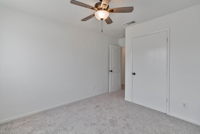 829 W Woodward Ave, Fresno, CA 93706 - empty room with carpet, a ceiling fan, and baseboards