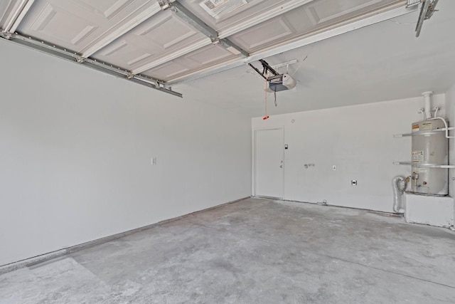 829 W Woodward Ave, Fresno, CA 93706 - garage featuring secured water heater and a garage door opener