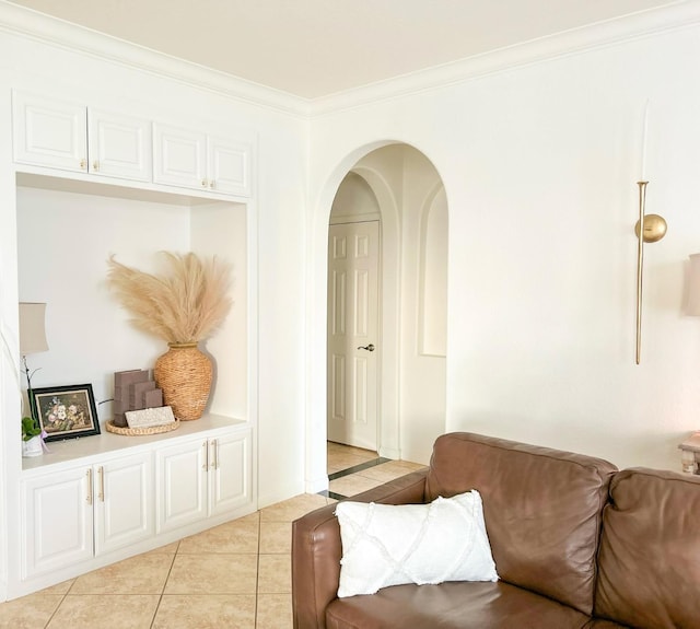 9130 Hunters Creek Way, Chowchilla, CA 93610 - sitting room featuring light tile patterned floors, crown molding, and arched walkways