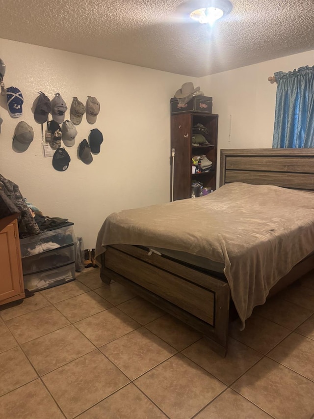 7121 Bobbie, Winton, CA 95388 - bedroom with light tile patterned flooring and a textured ceiling