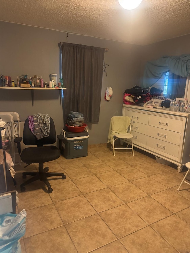 7121 Bobbie, Winton, CA 95388 - bedroom featuring a textured ceiling and light tile patterned flooring