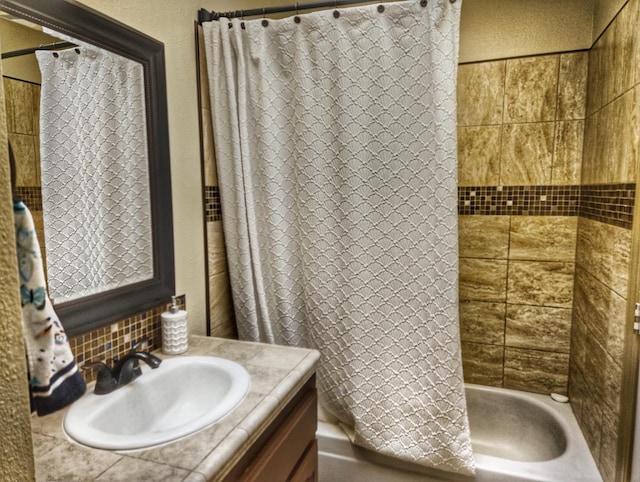 4352 W Los Altos, Fresno, CA 93722 - bathroom featuring vanity, shower / bath combination with curtain, and backsplash