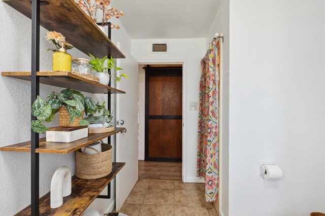 5554 E Montecito Ave, Fresno, CA 93727 - entryway featuring tile patterned floors and baseboards