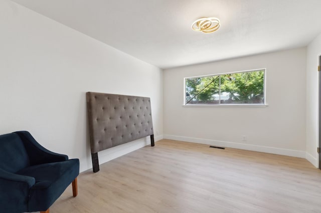 4489 N Chestnut Ave, Fresno, CA 93726 - sitting room featuring light wood finished floors and baseboards