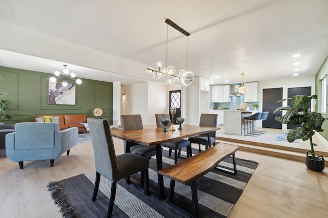 4489 N Chestnut Ave, Fresno, CA 93726 - dining room with a chandelier, light wood-style flooring, and recessed lighting