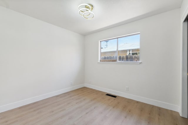 4489 N Chestnut Ave, Fresno, CA 93726 - unfurnished room with wood finished floors and baseboards