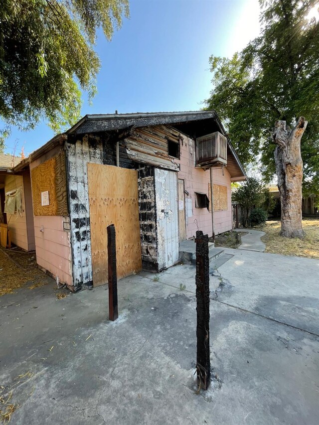 219 E Dennett Ave, Fresno, CA 93728 - view of home's exterior with a patio area
