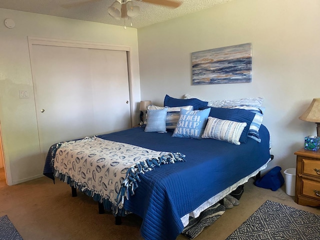 5815 E Lansing Way, Fresno, CA 93727 - carpeted bedroom featuring a closet and ceiling fan