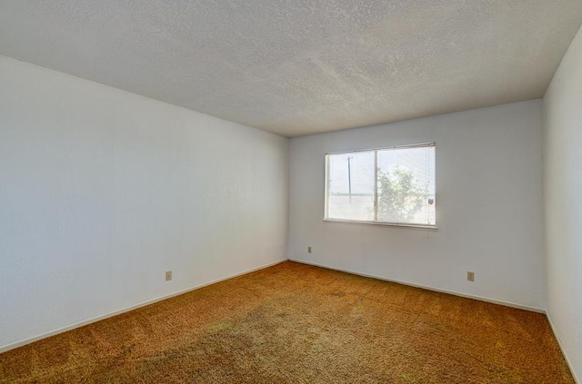 2100 E Linden Ave, Fresno, CA 93725 - unfurnished room featuring light carpet and a textured ceiling