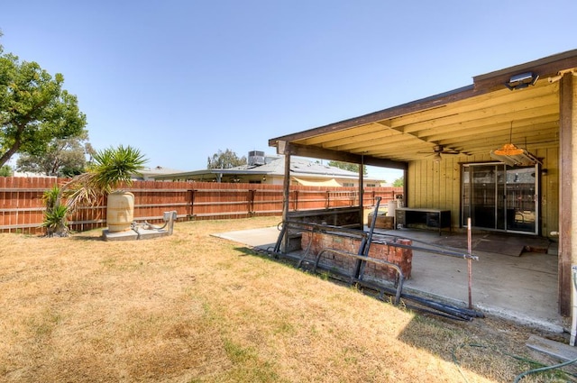 2100 E Linden Ave, Fresno, CA 93725 - view of yard with ceiling fan and a patio area