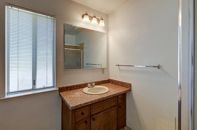 2100 E Linden Ave, Fresno, CA 93725 - bathroom featuring vanity and a shower