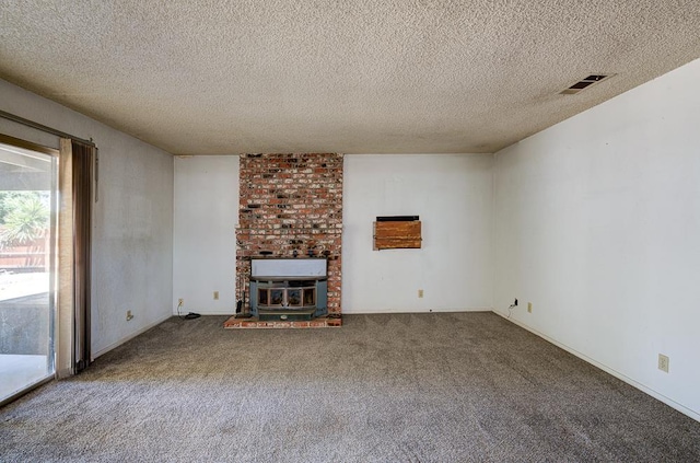 2100 E Linden Ave, Fresno, CA 93725 - unfurnished living room with carpet and a textured ceiling