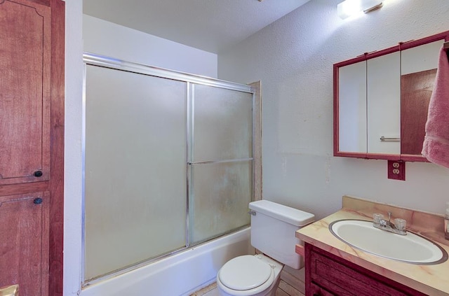 2100 E Linden Ave, Fresno, CA 93725 - full bath featuring vanity, toilet, and combined bath / shower with glass door
