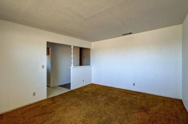 2100 E Linden Ave, Fresno, CA 93725 - carpeted spare room with a textured ceiling and baseboards