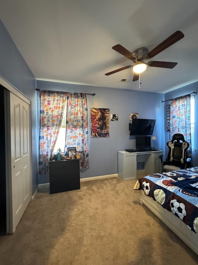 5312 W Cotton Ave, Fresno, CA 93722 - carpeted bedroom with baseboards, a ceiling fan, and a closet