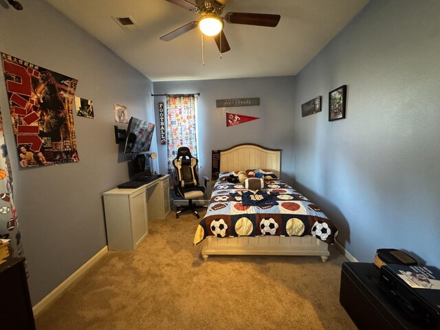 5312 W Cotton Ave, Fresno, CA 93722 - carpeted bedroom featuring baseboards and a ceiling fan