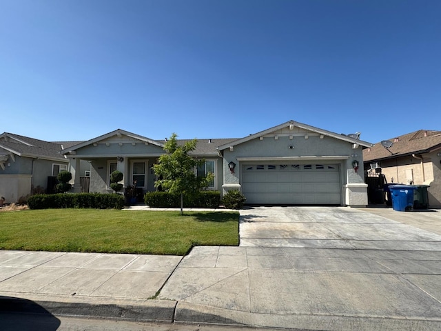 5312 W Cotton Ave, Fresno, CA 93722 - ranch-style house featuring concrete driveway, an attached garage, a front yard, and stucco siding