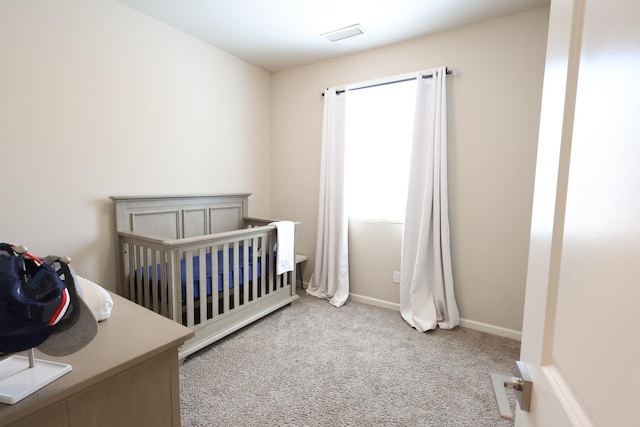 4090 Buckingham Ave, Clovis, CA 93619 - bedroom featuring carpet, a crib, and baseboards
