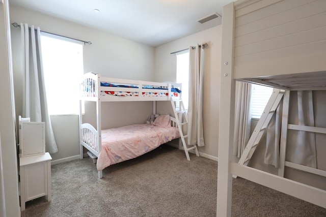 4090 Buckingham Ave, Clovis, CA 93619 - bedroom with multiple windows, carpet, and baseboards