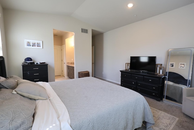 4090 Buckingham Ave, Clovis, CA 93619 - bedroom featuring vaulted ceiling, light carpet, and connected bathroom