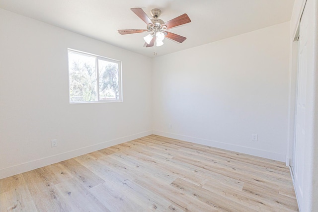 4930 E Olive Ave, Fresno, CA 93727 - unfurnished room with light wood finished floors, baseboards, and a ceiling fan
