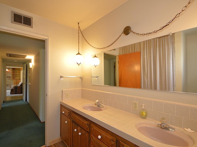 1692 W Tenaya Way, Fresno, CA 93711 - bathroom featuring double vanity and backsplash
