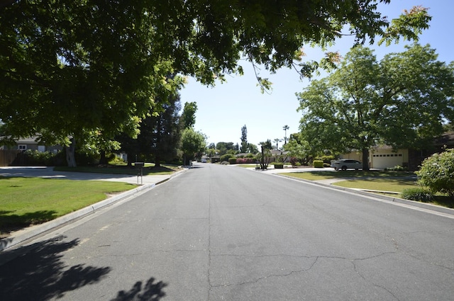 1692 W Tenaya Way, Fresno, CA 93711 - view of asphalt road with curbs