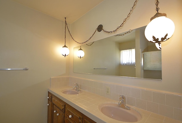 1692 W Tenaya Way, Fresno, CA 93711 - bathroom featuring decorative backsplash and double vanity