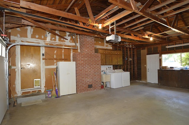 1692 W Tenaya Way, Fresno, CA 93711 - garage with a garage door opener and washing machine and clothes dryer