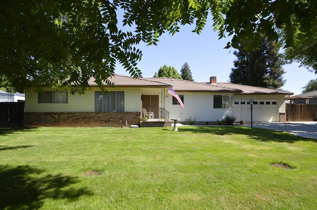 1692 W Tenaya Way, Fresno, CA 93711 - single story home featuring an attached garage, brick siding, driveway, and a chimney