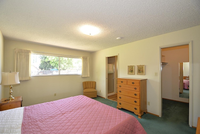 1692 W Tenaya Way, Fresno, CA 93711 - bedroom featuring a textured ceiling, carpet, and a spacious closet