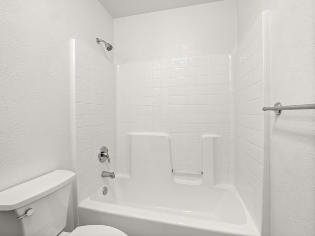 703 Tulip Cir, Dinuba, CA 93618 - full bathroom featuring toilet and bathing tub / shower combination