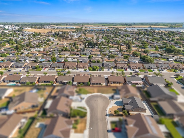 703 Tulip Cir, Dinuba, CA 93618 - aerial view of property and surrounding area with nearby suburban area